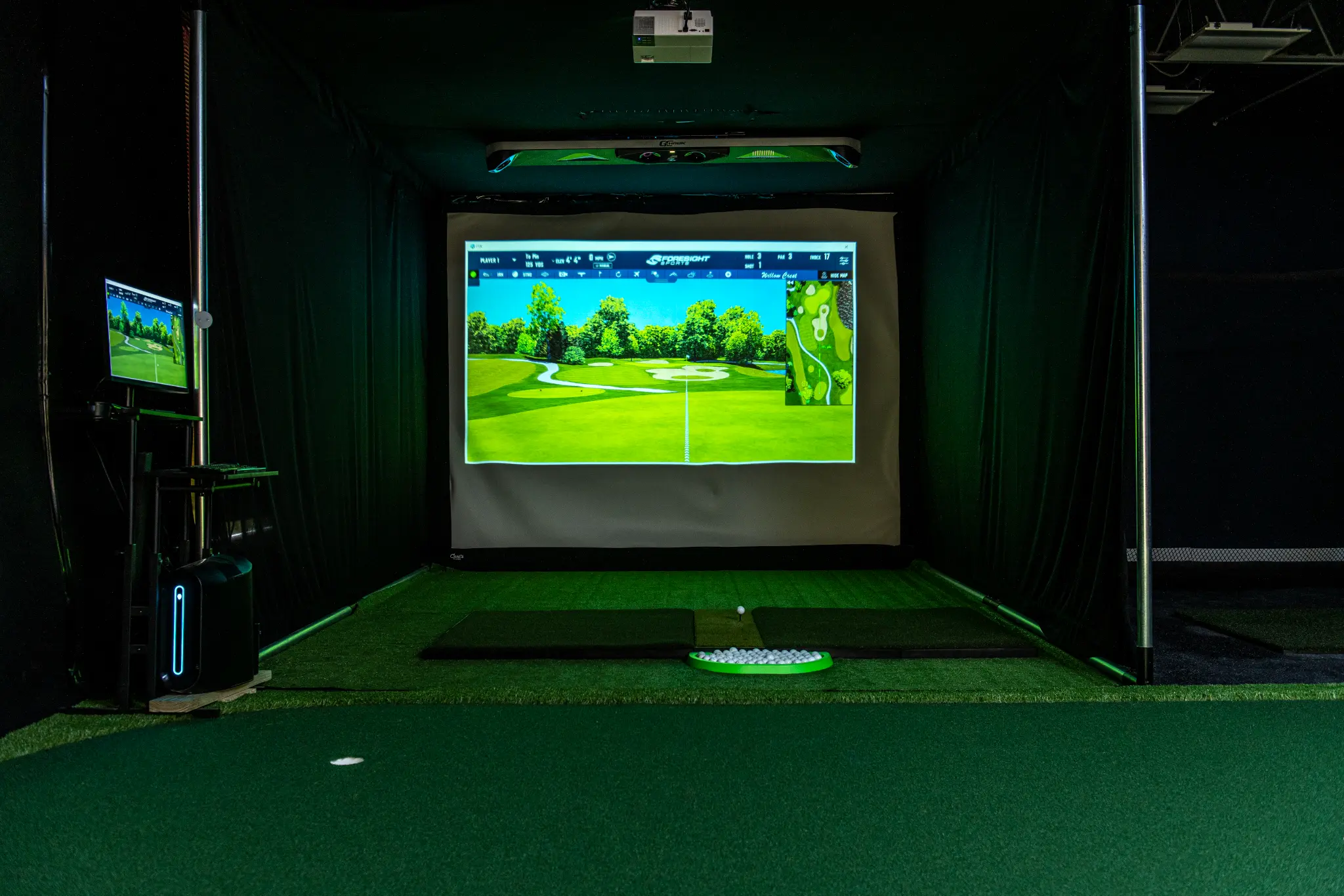 Precision Golf Training indoor facility — simulator bays, putting green, and fitness area in Libertyville IL